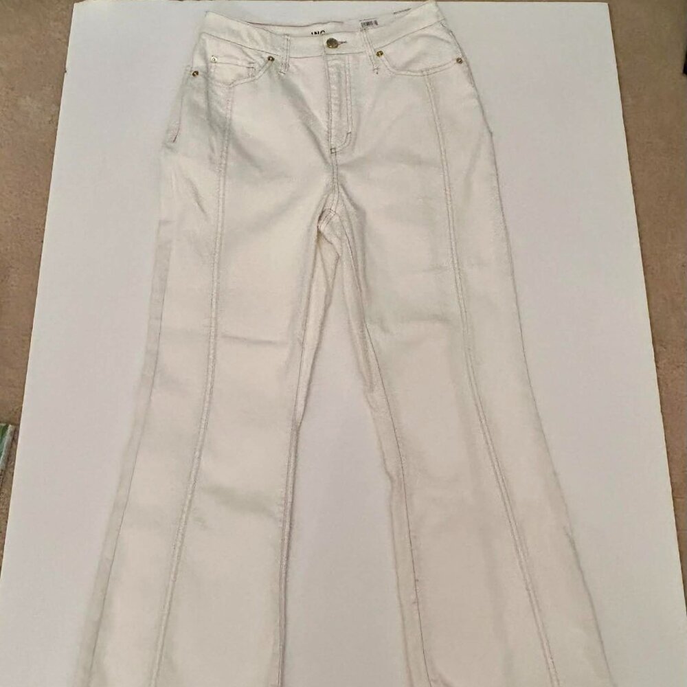 Inc. cream colored bootcut ladie's jeans.